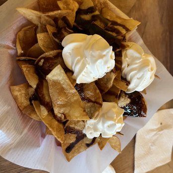 Salt & Swine - a bowl of nachos with sour cream - Mexican Near Me - Gibsons, British Columbia Salt & Swine - a bowl of nachos with sour cream - Mexican Near Me - Gibsons, British Columbia