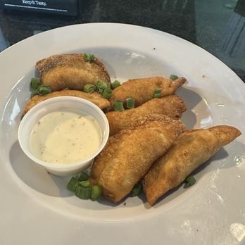 Molly Maguire's Irish Pub - Buffalo chicken pockets for happy hour. - Pubs Near Me - Cocoa Beach, Florida Molly Maguire's Irish Pub - Buffalo chicken pockets for happy hour. - Pubs Near Me - Cocoa Beach, Florida