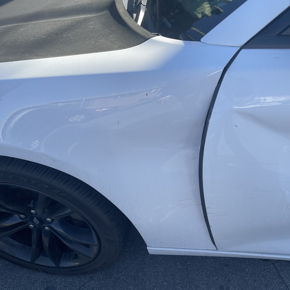 Damage to my fender from the accident Damage to my fender from the accident