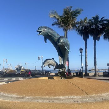 Stearns Wharf - iconic dolphin statue at the entrance. - Local Flavor Near Me - Santa Barbara, California