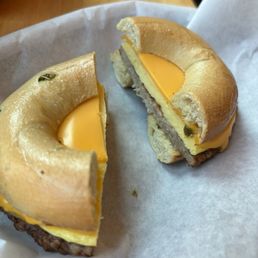 Jalapeño bagel with sausage, egg, and cheese. Jalapeño bagel with sausage, egg, and cheese.