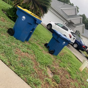 K & D Roofing & Construction - The trash cans that they placed on our lawn and the area they stepped all over and made worse. - Roofing Near Me - Jacksonville Beach, Florida K & D Roofing & Construction - The trash cans that they placed on our lawn and the area they stepped all over and made worse. - Roofing Near Me - Jacksonville Beach, Florida