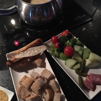 The Melting Pot - Phoenix - Lots of bread, chips, meats, and veggies are now included. - Fondue Near Me - Phoenix, Arizona The Melting Pot - Phoenix - Lots of bread, chips, meats, and veggies are now included. - Fondue Near Me - Phoenix, Arizona