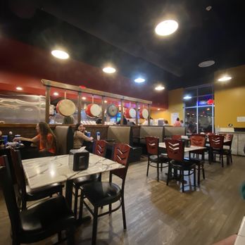 Bonfire - people sitting at tables in a restaurant - Mongolian Near Me - Hermitage, Tennessee Bonfire - people sitting at tables in a restaurant - Mongolian Near Me - Hermitage, Tennessee