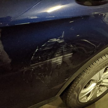 Dent Pro Mobile - Before - damaged rear passenger door that was scraped against the pillar in the garage - Body Shops Near Me