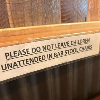 North Fork Pizza - Thought this was funny. Too many kids falling off the stools?!?! - Pizza Near Me - Columbia Falls, Montana