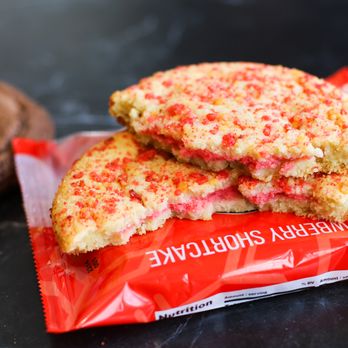 Detroit Wing Company - two pieces of pizza on a red bag - Chicken Wings Near Me - Troy, Michigan Detroit Wing Company - two pieces of pizza on a red bag - Chicken Wings Near Me - Troy, Michigan