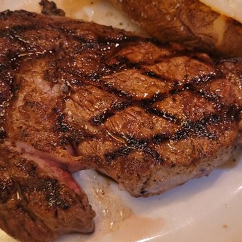 Texas Roadhouse - Rib eye med rare w potato - American Near Me - Boynton Beach, Florida
