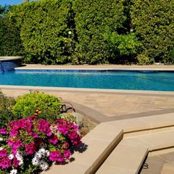 Gold Coast Pool - Bella Crete Coping, pavers, and Aqua white pebble.