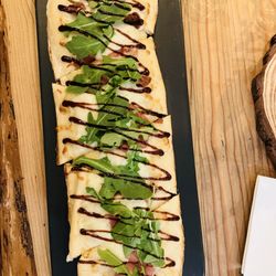 Cork & Stem - Prosciutto arugula flatbread