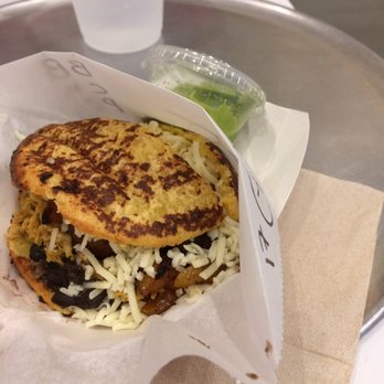 Guasaca - Yellow corn arepa con pollo, frijoles negros, queso, y plantains. Yummy!!! - Venezuelan Near Me - Durham, North Carolina