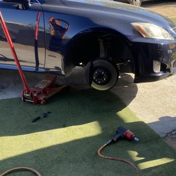 ADA Road Service And Towing - Car Getting New Tires. - Roadside Assistance Near Me ADA Road Service And Towing - Car Getting New Tires. - Roadside Assistance Near Me