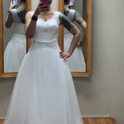 Mercy's Custom Bridal Designs & Alterations - Dress fitting