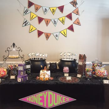 Sweetly Blessed Baker - Candy buffet with cake pops in cauldrons - Bakeries Near Me Sweetly Blessed Baker - Candy buffet with cake pops in cauldrons - Bakeries Near Me