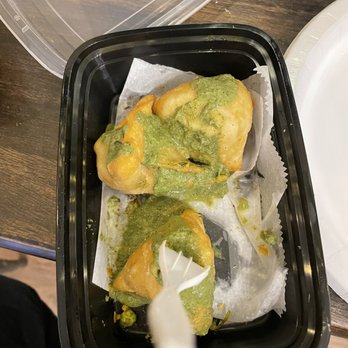 MoMo House - Here's an example of the green sauce on the Samosa - Himalayan/Nepalese Near Me - Berkeley, California