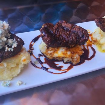 Barrel33 - a plate of food on a table - Bars Near Me - Warren, Ohio