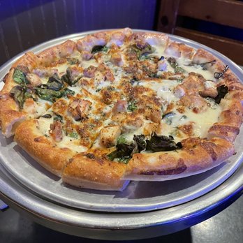 Rocky's Corner - White Alfredo pizza with chicken and spinach! - Italian Near Me - Hot Springs, Arkansas Rocky's Corner - White Alfredo pizza with chicken and spinach! - Italian Near Me - Hot Springs, Arkansas