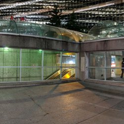 Queen's Park Subway Station - Entrance to station on south west corner at night looking south. September 2018