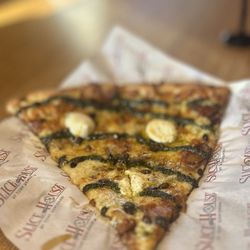 Slice House by Tony Gemignani - FIGGY PIGGY: Bacon, Mozzarella, Fig Preserve, Toasted Pine Nuts, Blue Cheese Crumble, Ricotta, Orange Zest, Pesto, Hot Pepper Oil | $7.5