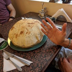 Grillroom Shalom - Hand for scale