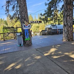 Abel's Apple Acres - Back patio area leading to a lower area.
