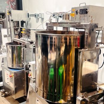 Bibamba - The mixer of delicious chocolate in the kitchen half of the store - Chocolatiers & Shops Near Me - Edgewater, Colorado