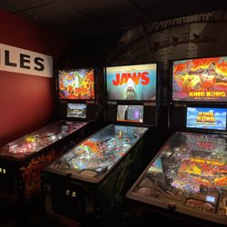 Temkin's Bar - Godzilla, Jaws, and King Kong pinball machines.