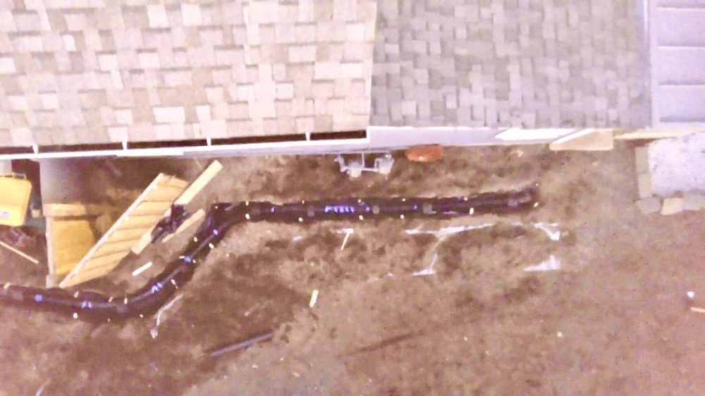 Slide of Mainline Drain & Construction