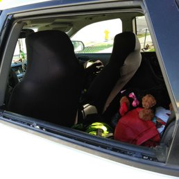 Broken rear window on passenger side.