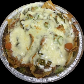 Taqueria Cecilio - a plate of nachos - Food Trucks Near Me - Brooklyn, New York Taqueria Cecilio - a plate of nachos - Food Trucks Near Me - Brooklyn, New York