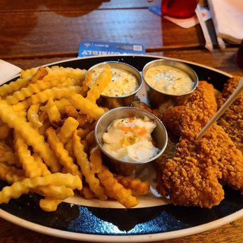 The Corner Pub and Grill - Fish n' Chips with crinkle cut fries - Sports Bars Near Me - O'fallon, Missouri The Corner Pub and Grill - Fish n' Chips with crinkle cut fries - Sports Bars Near Me - O'fallon, Missouri