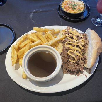 Blacksteer Steakhouse and Saloon - Prime Rib Po' boy with au jus and fries - Steakhouses Near Me - Bend, Oregon