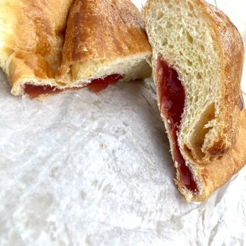 Azteca Bakery - a half eaten sandwich with a bite taken out of it - Bakeries Near Me - Wallingford, Connecticut