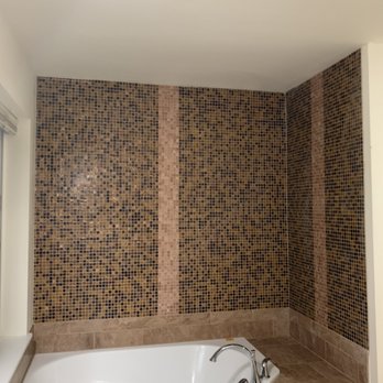 Zeneli’s Flooring - a bathtub in a bathroom - Flooring Near Me Zeneli’s Flooring - a bathtub in a bathroom - Flooring Near Me