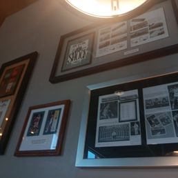 Wall art next to booth. Wall art next to booth.