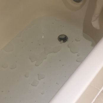 Hilton Suites Boca Raton - Standing water in tub that drains AFTER you're done showering. - Hotels Near Me - Boca Raton, Florida