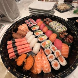 Deluxe Happy Platter. Disappointing! Terrible selection and Anari (2) and Flying Fish Roe (2) pieces do not count as rolls!!