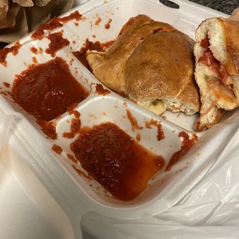 Pizza Dí Marco - Deluxe calzone....barely any filling, ALL BREAD. Was bland and soggy. - Italian Near Me - Valencia, California Pizza Dí Marco - Deluxe calzone....barely any filling, ALL BREAD. Was bland and soggy. - Italian Near Me - Valencia, California