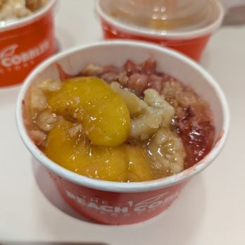 The Peach Cobbler Factory - Peach Strawberry Cobbler and comes with Ice Cream - Desserts Near Me - Chandler, Arizona