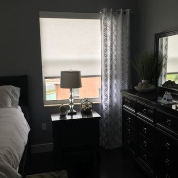 LW Interiors - Roller shade and side panels with drapery hardware - Furniture Reupholstery Near Me - Pompano Beach, Florida
