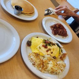 Vegetarian omlette, hasbrowns, corned beef hash and pancakes Vegetarian omlette, hasbrowns, corned beef hash and pancakes