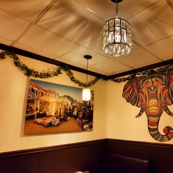 Mango Indian Cuisine - the interior of the restaurant - Indian Near Me - Bellmore, New York Mango Indian Cuisine - the interior of the restaurant - Indian Near Me - Bellmore, New York