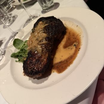 The Capital Grille - Dry Aged NY/KC Strip au Poivre with Courvoisier Cream - Steakhouses Near Me - Boston, Massachusetts The Capital Grille - Dry Aged NY/KC Strip au Poivre with Courvoisier Cream - Steakhouses Near Me - Boston, Massachusetts