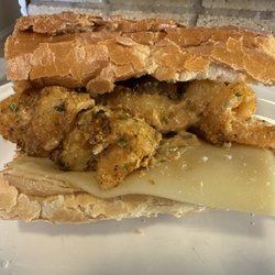 The PoBoy Shop - Shrimp Poboy on Laglanais French bread. Added the Cajun Mayo, Pepper Jack Cheese and pickles. Amazing!