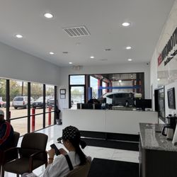 Yes! Automotive - Interior view of YES! Automotive Porter, TX customer waiting area and service reception...