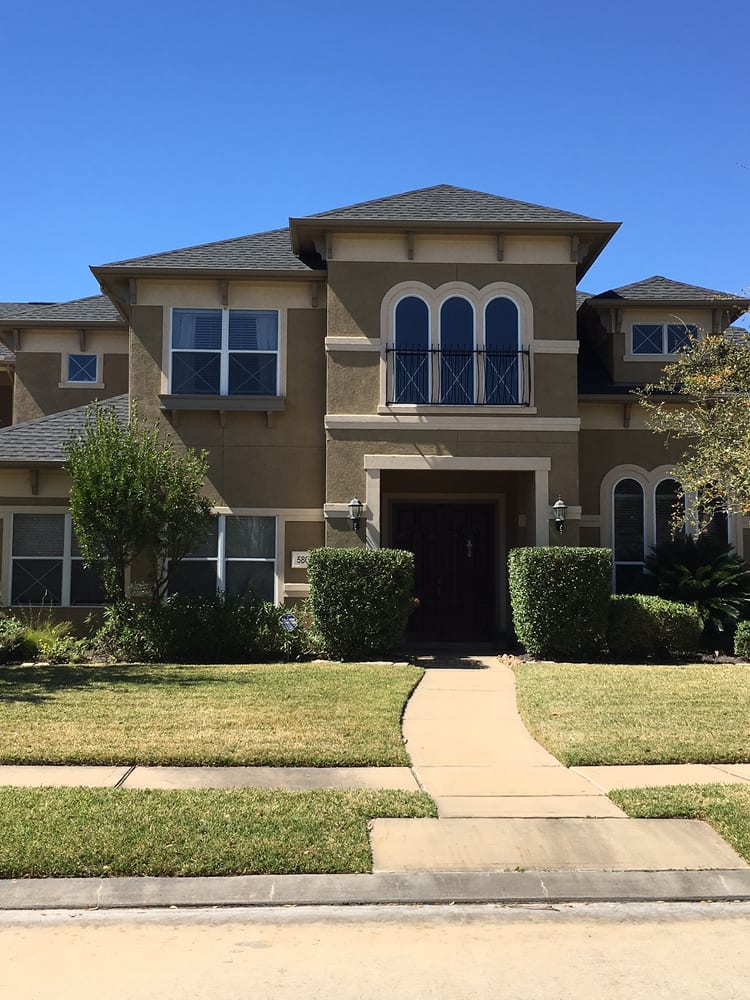 Slide of Houston Roofing & Construction