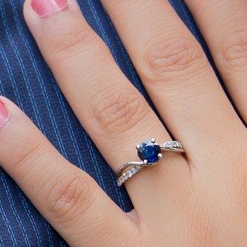 Powers Jewelry Designers - Her beautiful sapphire engagement ring with diamonds in a custom palladium setting. - Jewelry Near Me - Milwaukee, Wisconsin