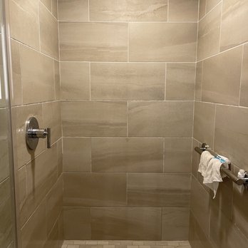 Max Beach Resort - They really need a shelf and/or ledge to place shampoo bottles and soap. - Hotels Near Me - Dayton Beach Shores, Florida