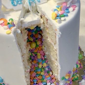 Cinderella Cakes - Piñata cake sliced open - Desserts Near Me - Anaheim, California