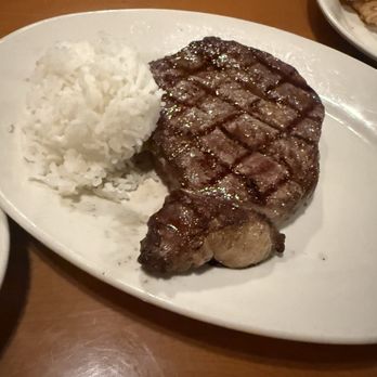 Black Angus Steakhouse - Medium rare ribeye before we halved it. - Steakhouses Near Me - Pearl City, Hawaii Black Angus Steakhouse - Medium rare ribeye before we halved it. - Steakhouses Near Me - Pearl City, Hawaii